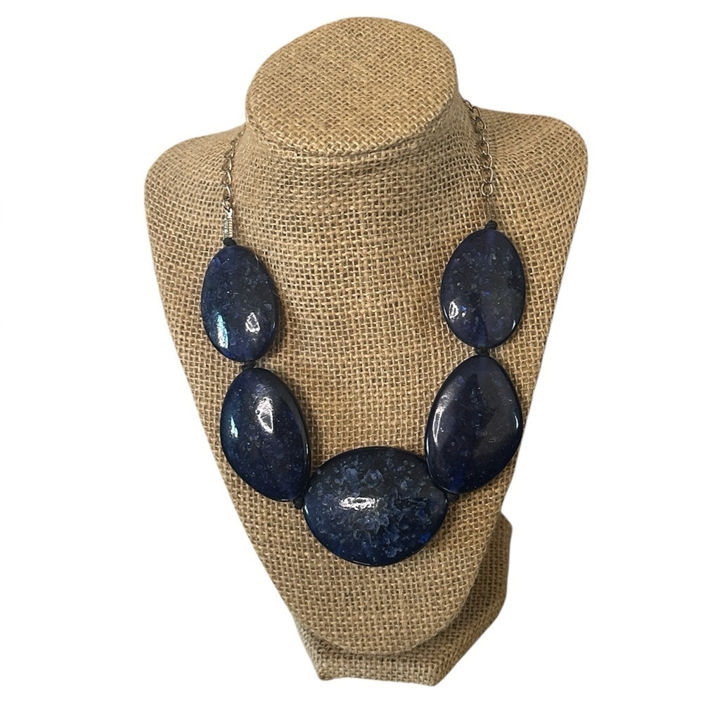 Charming Charlie gold-tone necklace with blue stones.